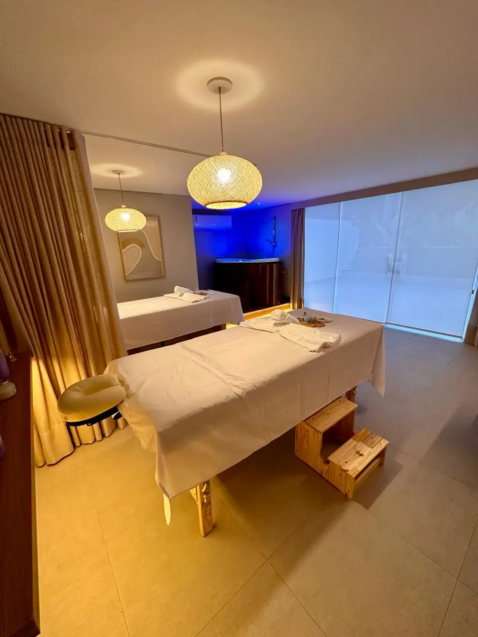 Massage room with treatment tables at Drs da Beleza